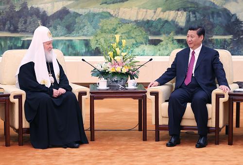 5月10日,国家主席习近平在北京人民大会堂会见俄罗斯东正教大牧首基里尔。新华社记者 姚大伟 摄