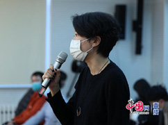 封面新闻记者提问.jpg